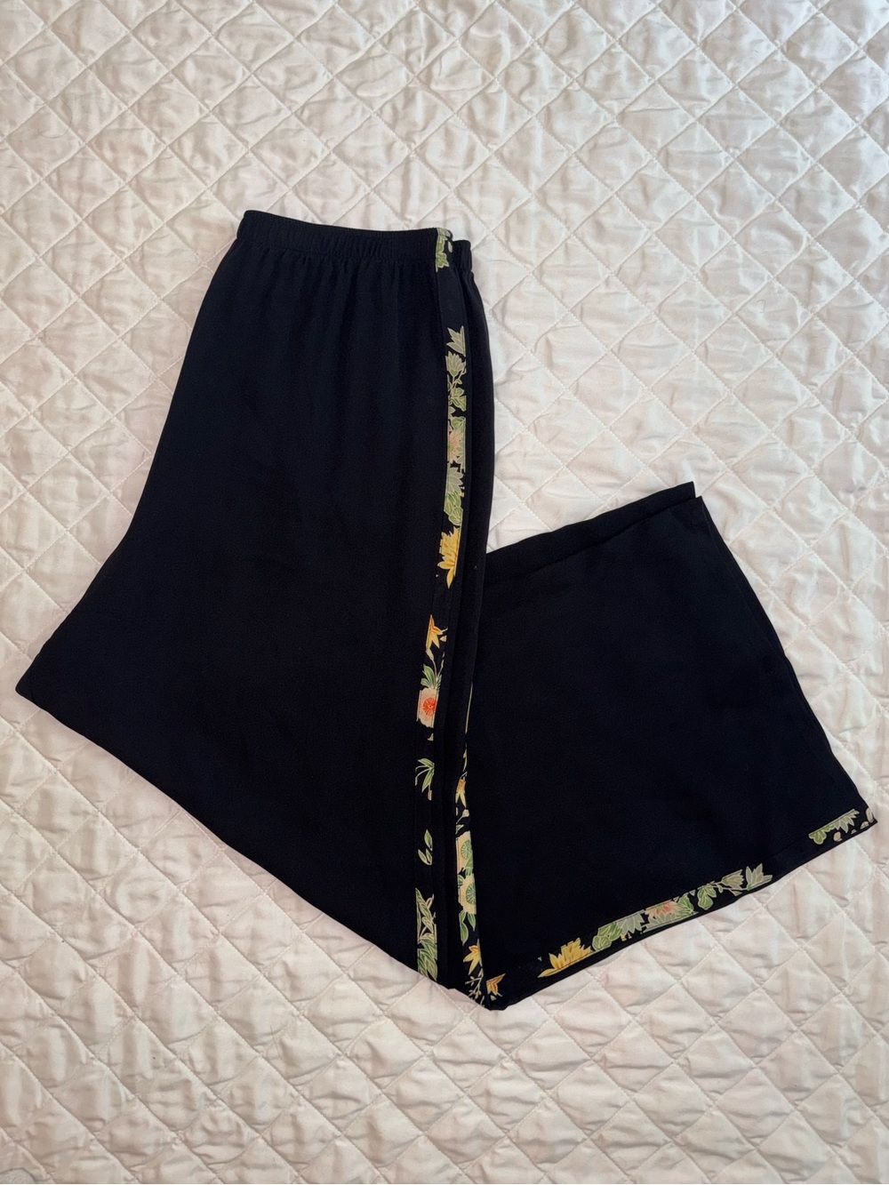 black silk pants with floral trim